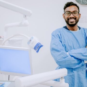 Young_dentist_or_dental_assistant_in_gown_1200x630 How Dental Office Support Services Improve Patient Experience